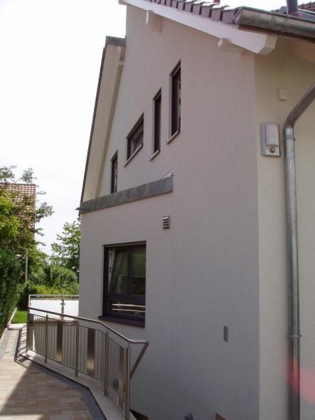 Holz-Alufenster mit Fensterbänken in Alu