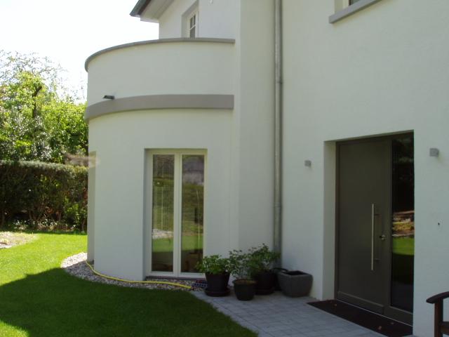 Holz-Balkontüre mit Stulp und Vollblatttüre mit Seitenteil